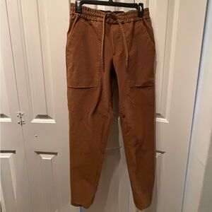Lululemon Brown Casual Pants fits like women S unisex style